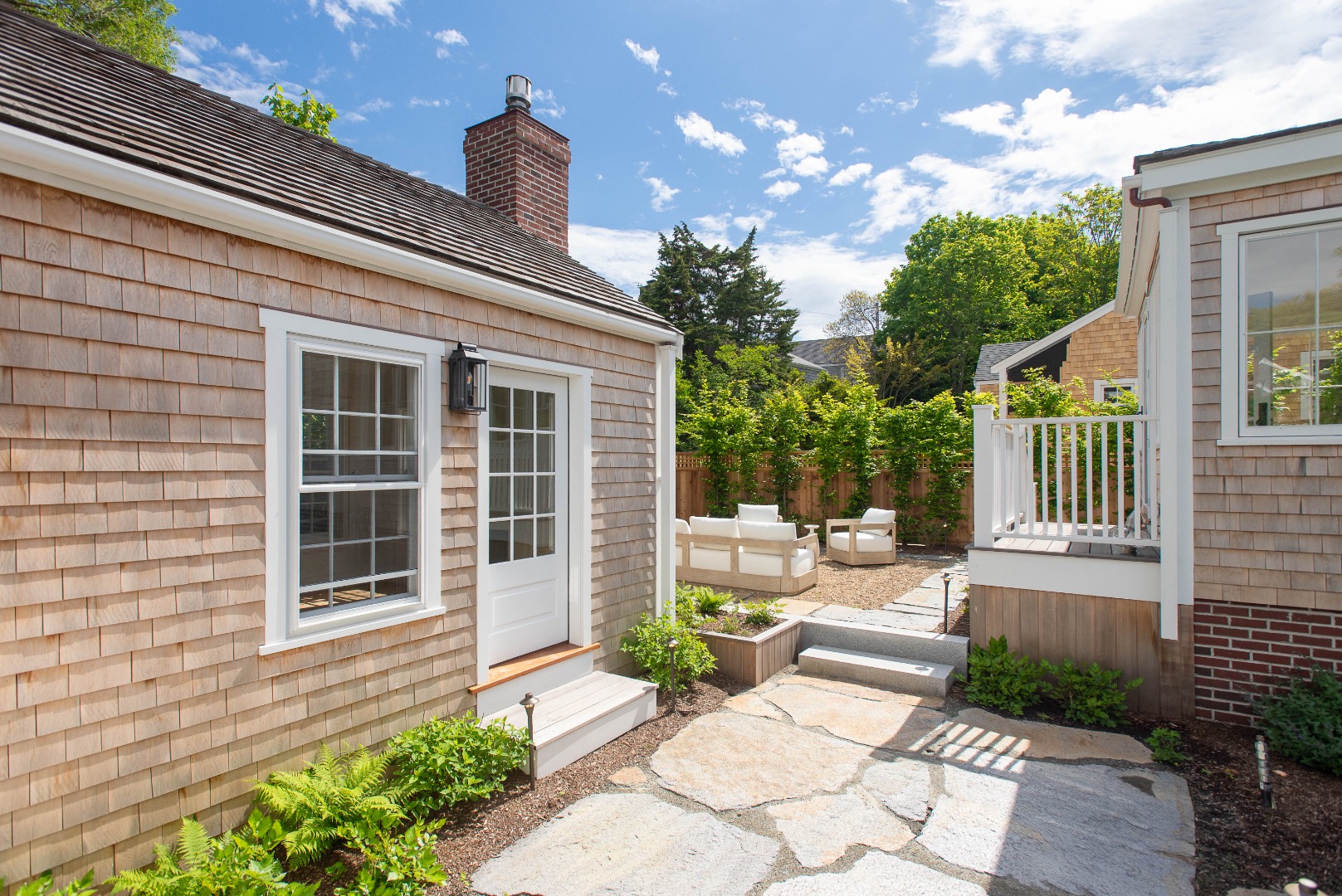 10 Silver Street Nantucket, MA 02554 - Photo 6 of 48 a view of a house with backyard and sitting area
