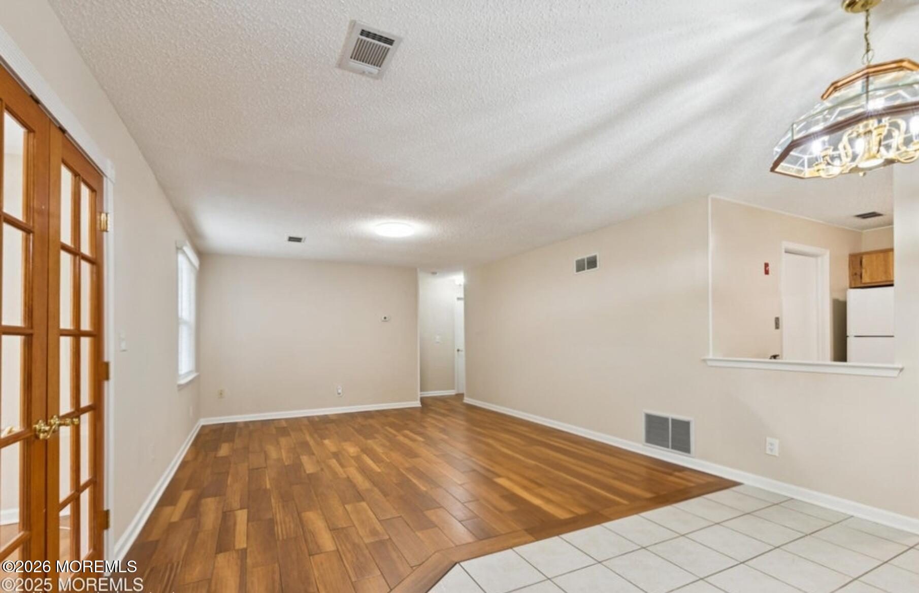 20-3 Austin Court, Unit 7 Freehold, NJ 07728 - Photo 11 of 31 a view of empty room
