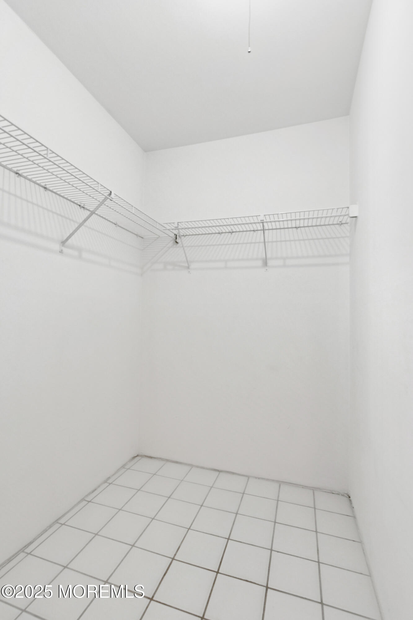 20-3 Austin Court, Unit 7 Freehold, NJ 07728 - Photo 17 of 31 a view of an empty room