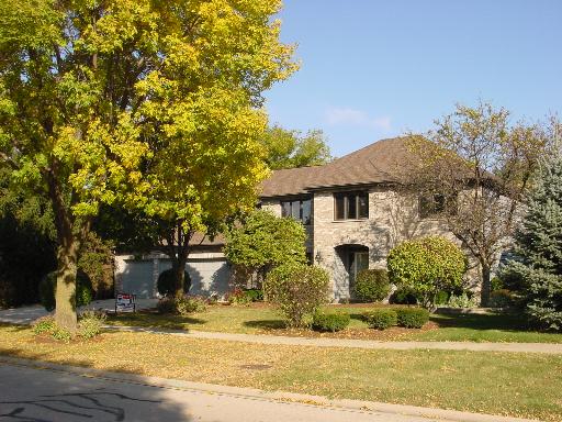 2648 Modaff Road Naperville, IL 60565 - Photo 1 of 1 a front view of a house with a yard