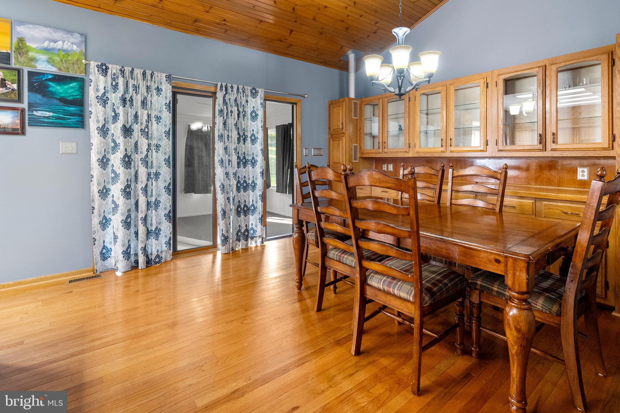 133 Roop Road Rising Sun, MD 21911 - Photo 11 of 58 a view of a dining room with furniture and wooden floor