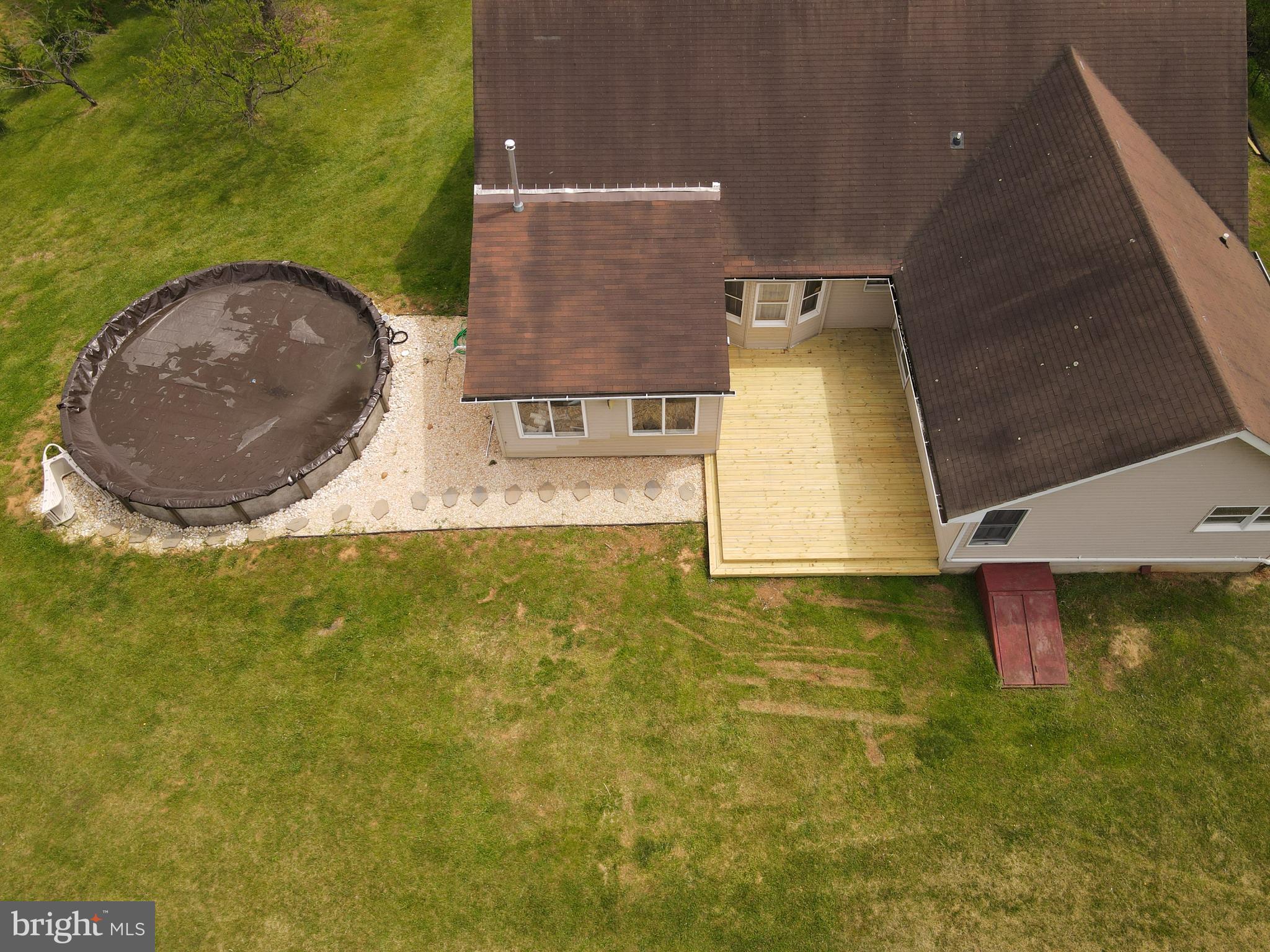 133 Roop Road Rising Sun, MD 21911 - Photo 40 of 58 an aerial view of a house with a swimming pool