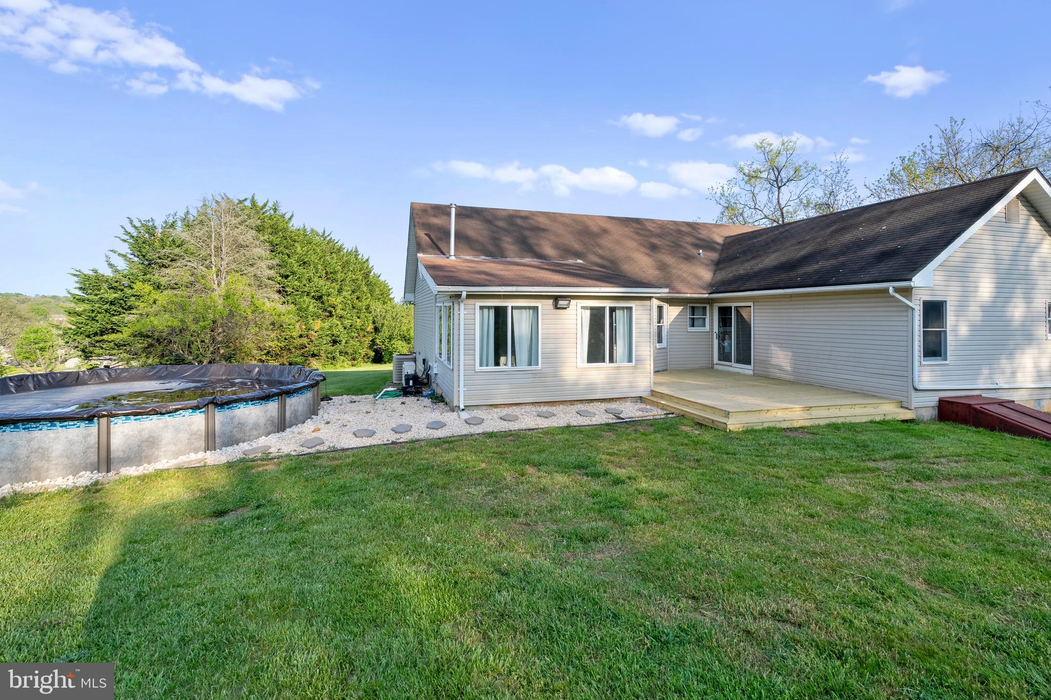 133 Roop Road Rising Sun, MD 21911 - Photo 44 of 58 a view of a house with a backyard porch and sitting area