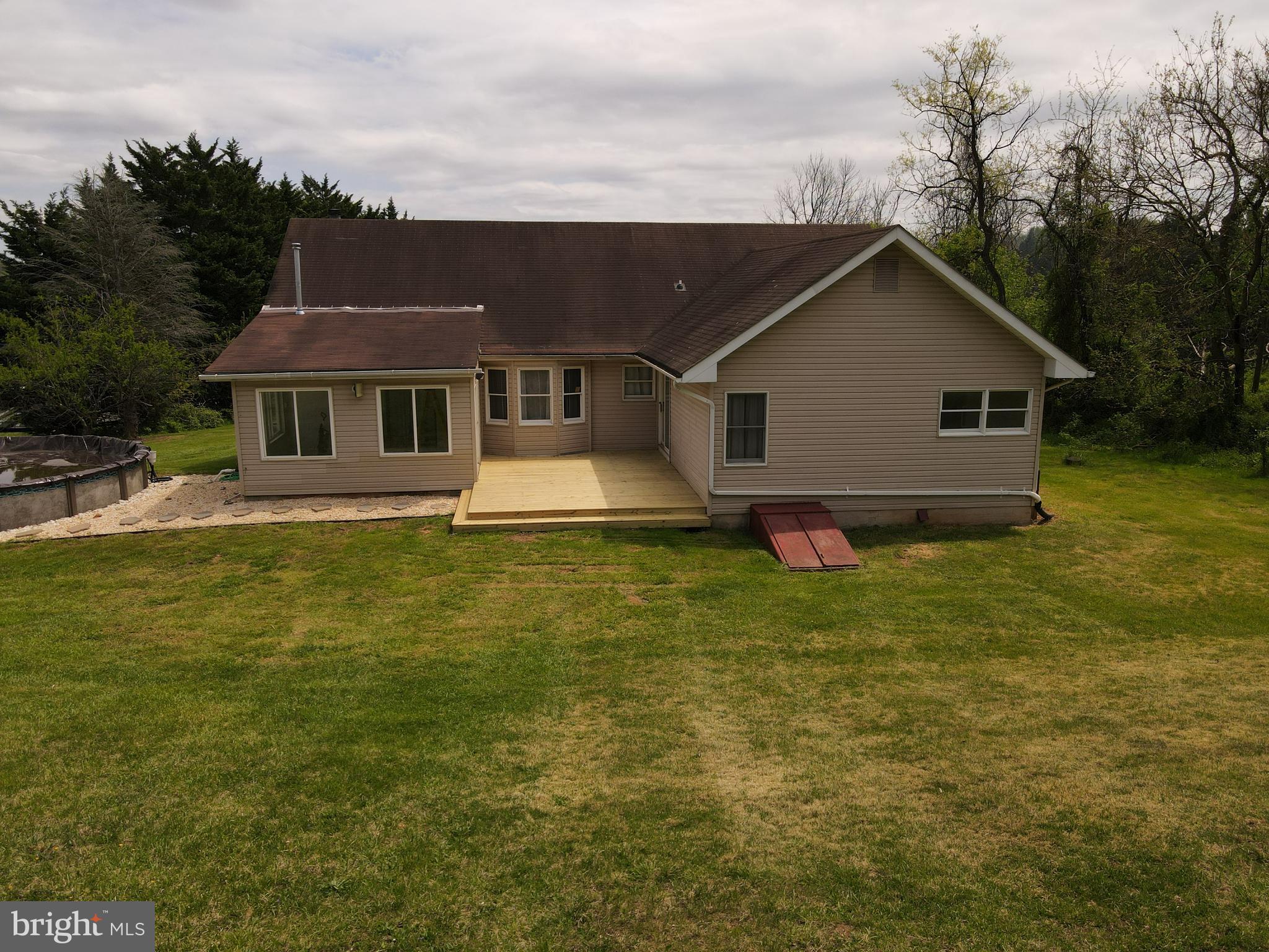133 Roop Road Rising Sun, MD 21911 - Photo 7 of 58 a front view of house with yard and green space