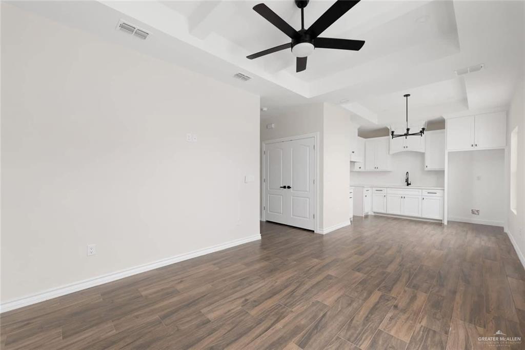 601 East Allende Avenue Roma, TX 78584 - Photo 2 of 5 wooden floor in an empty room