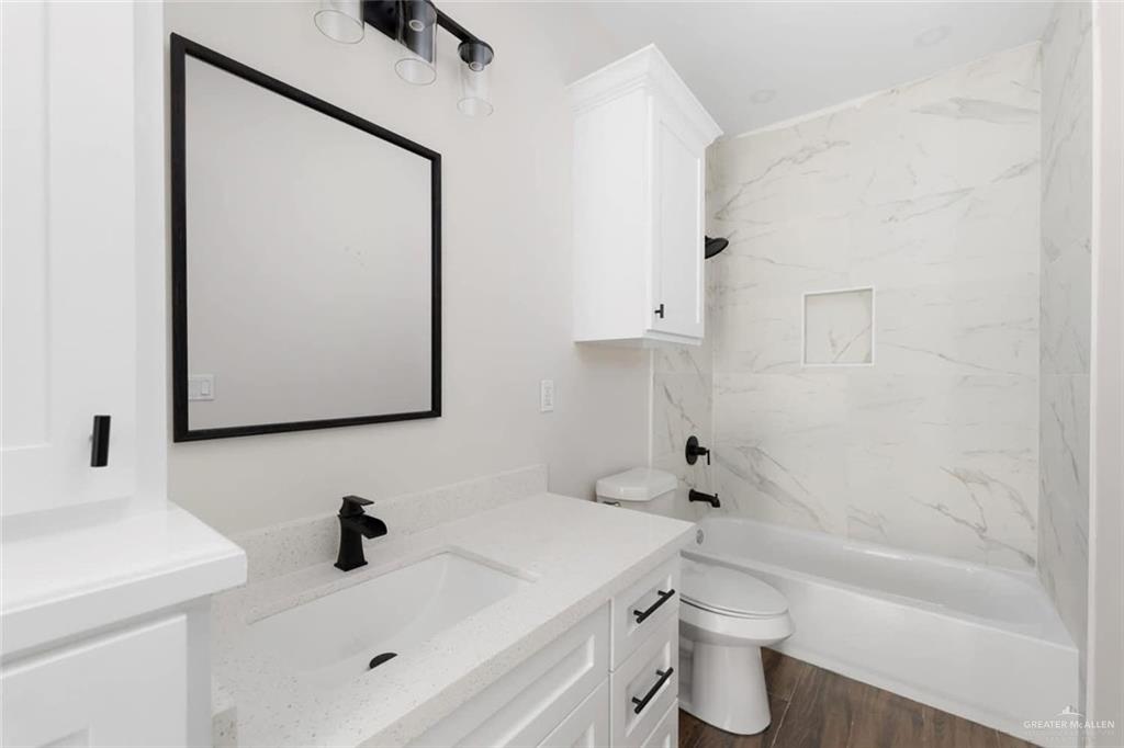 601 East Allende Avenue Roma, TX 78584 - Photo 3 of 5 a bathroom with a sink toilet and shower