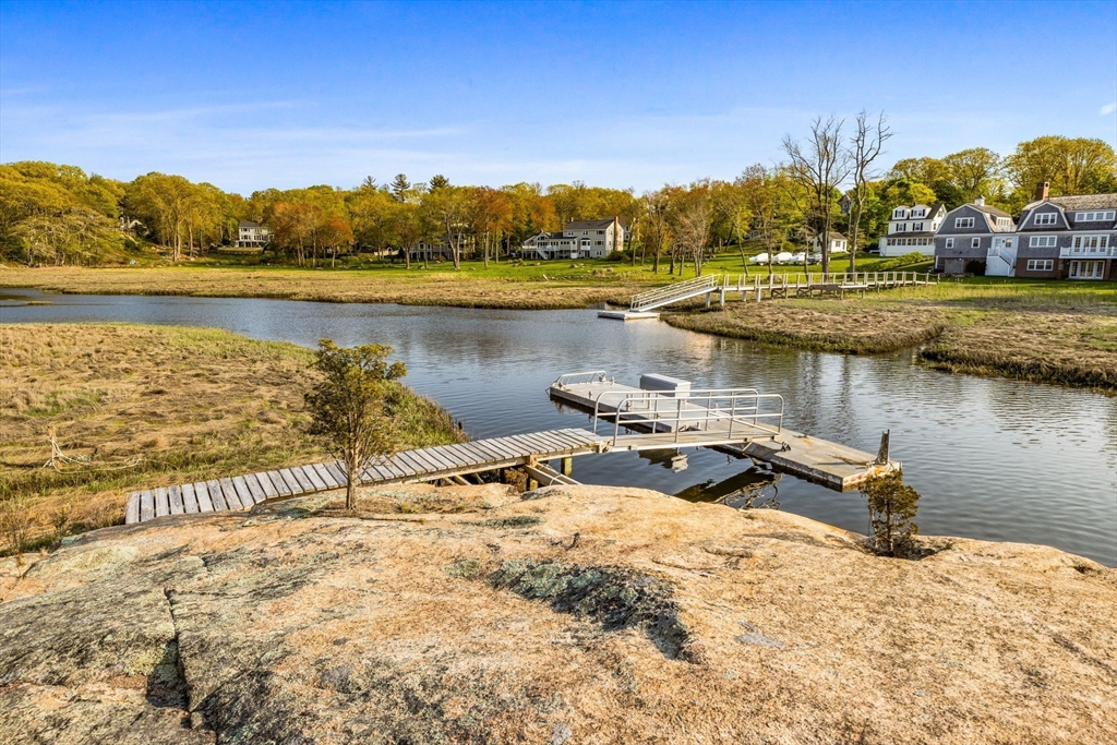1 R Bailey's Island Road Scituate, MA 02066 - Photo 40 of 42 a view of a lake with houses in the back