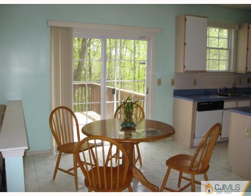 12 Timber Ridge Road North Brunswick, NJ 08902 - Photo 4 of 9 a dining room with furniture and window