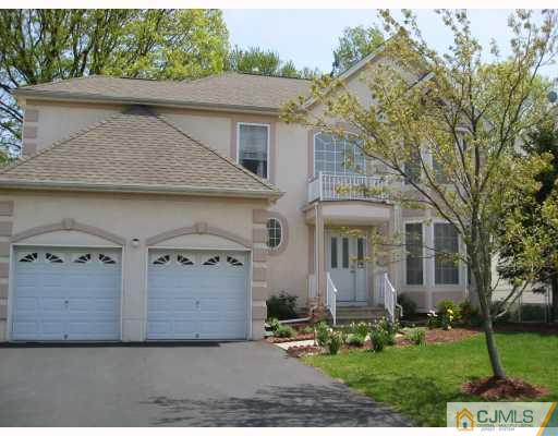 12 Timber Ridge Road North Brunswick, NJ 08902 - Photo 9 of 9 front view of a house with a yard