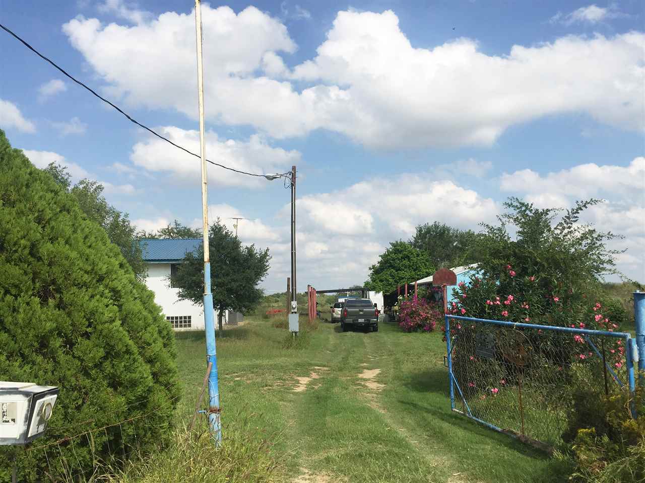 379 Well Lane Laredo, TX 78045 - Photo 20 of 20 a view of a fountain in front of a house