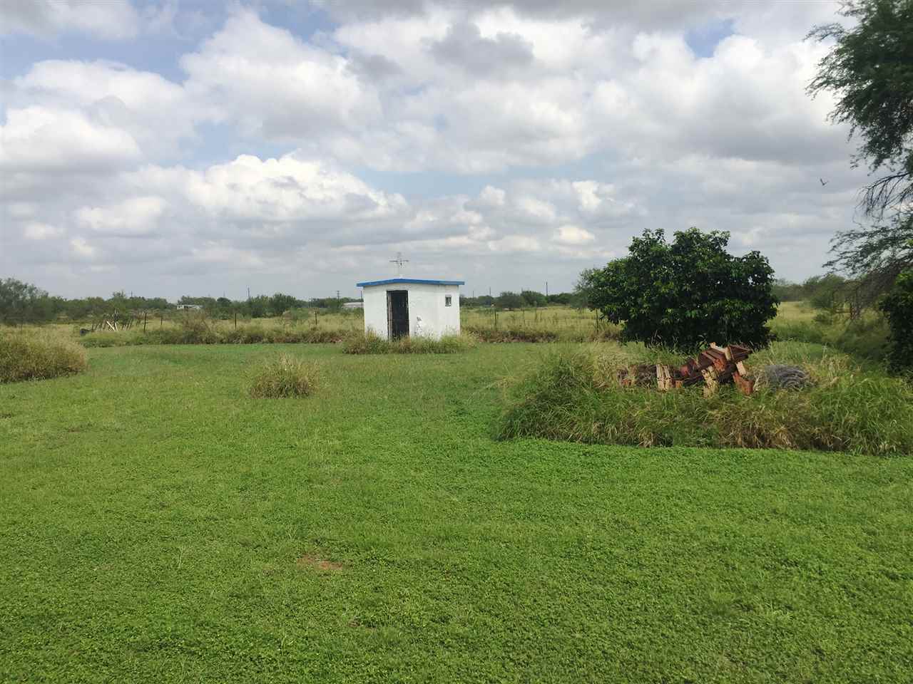 379 Well Lane Laredo, TX 78045 - Photo 3 of 20 a view of a lake with a big yard