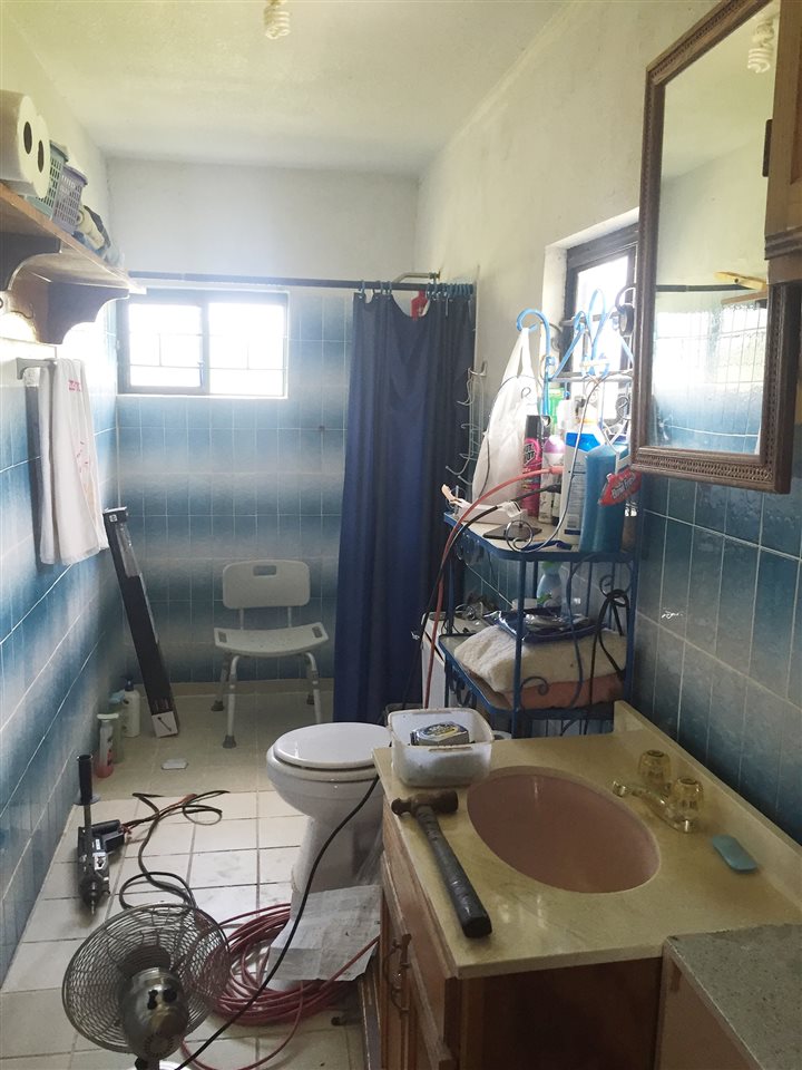 379 Well Lane Laredo, TX 78045 - Photo 5 of 20 a dining room with furniture and a chandelier