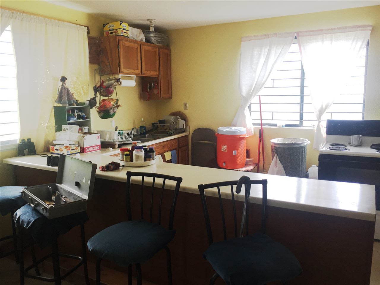 379 Well Lane Laredo, TX 78045 - Photo 6 of 20 a kitchen with a table chairs and a dining table