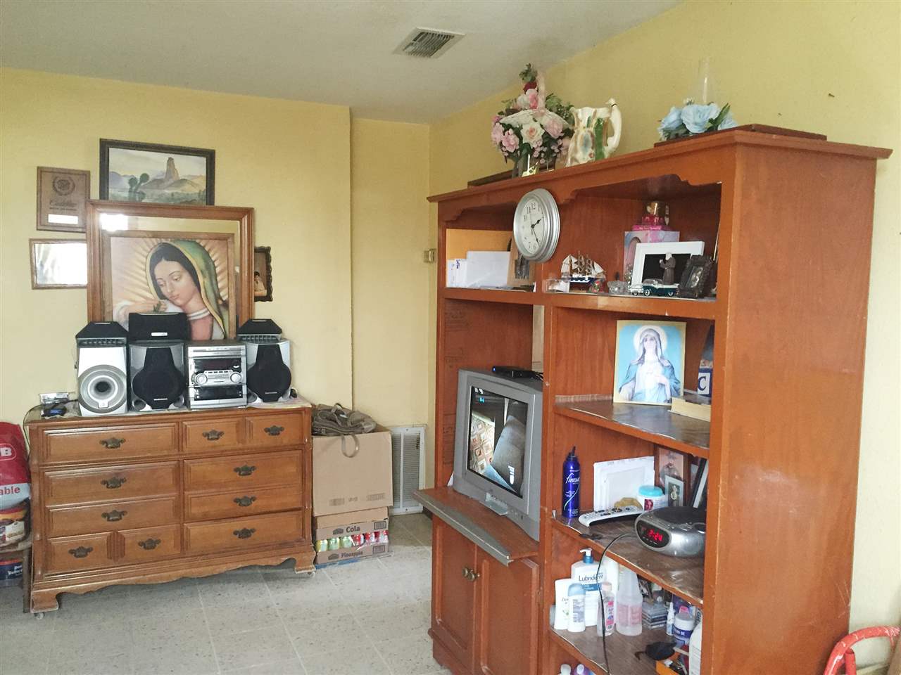 379 Well Lane Laredo, TX 78045 - Photo 7 of 20 a view of a bedroom with baby bed and cabinet