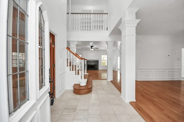 a view of entryway with wooden floor
