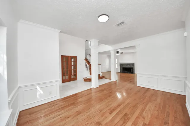 a view of a livingroom with wooden floor