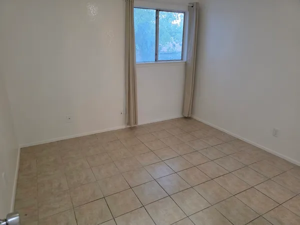 an empty room with windows