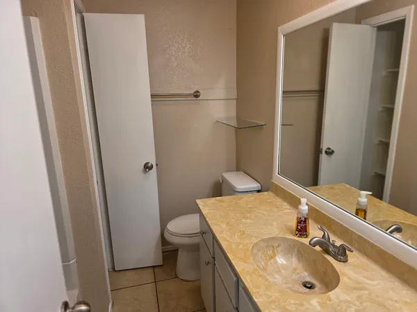 a kitchen with a stove and a microwave