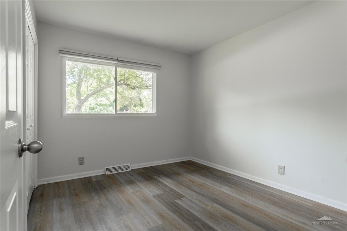28 Hampton Road Montgomery, IL 60538 - Photo 17 of 27 an empty room with a window