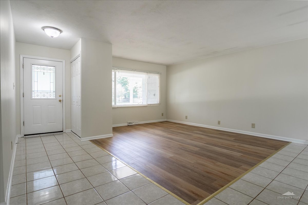 28 Hampton Road Montgomery, IL 60538 - Photo 5 of 27 an empty room with windows