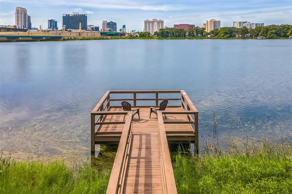 320 Lakeview Street, Unit 110 Orlando, FL 32804 - Photo 1 of 18 a view of a city skyline from a balcony