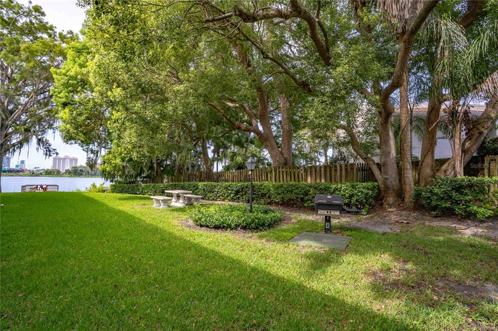 320 Lakeview Street, Unit 110 Orlando, FL 32804 - Photo 17 of 18 a view of backyard with green space
