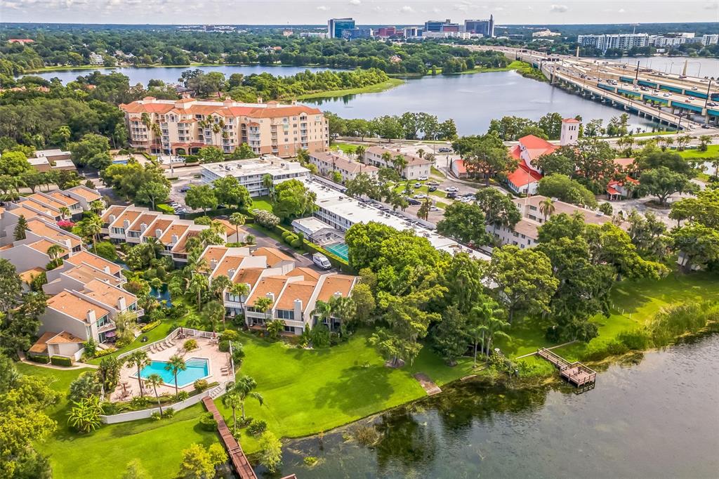 320 Lakeview Street, Unit 110 Orlando, FL 32804 - Photo 2 of 18 an aerial view of residential houses with outdoor space and river