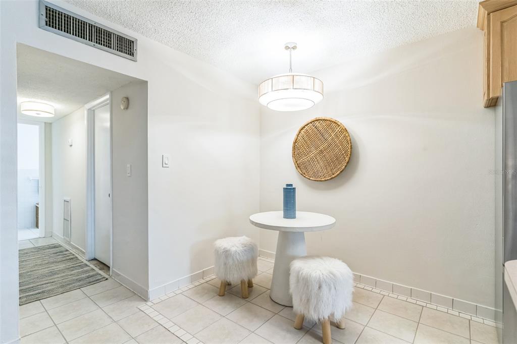 320 Lakeview Street, Unit 110 Orlando, FL 32804 - Photo 8 of 18 a front view of a house with garden space and stairs