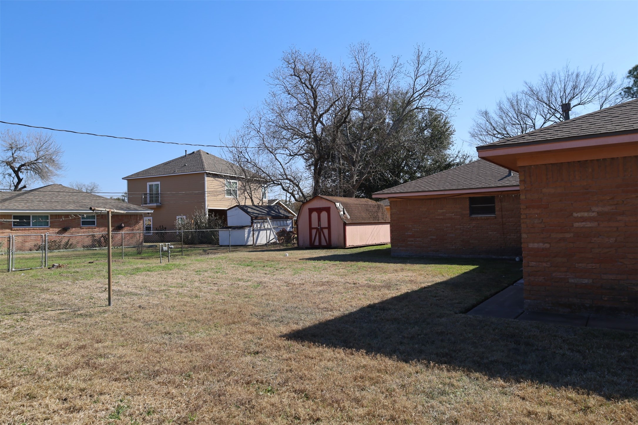 13207 Santa Teresa Road Houston, TX 77045 - Photo 19 of 20 a front view of a house with garden