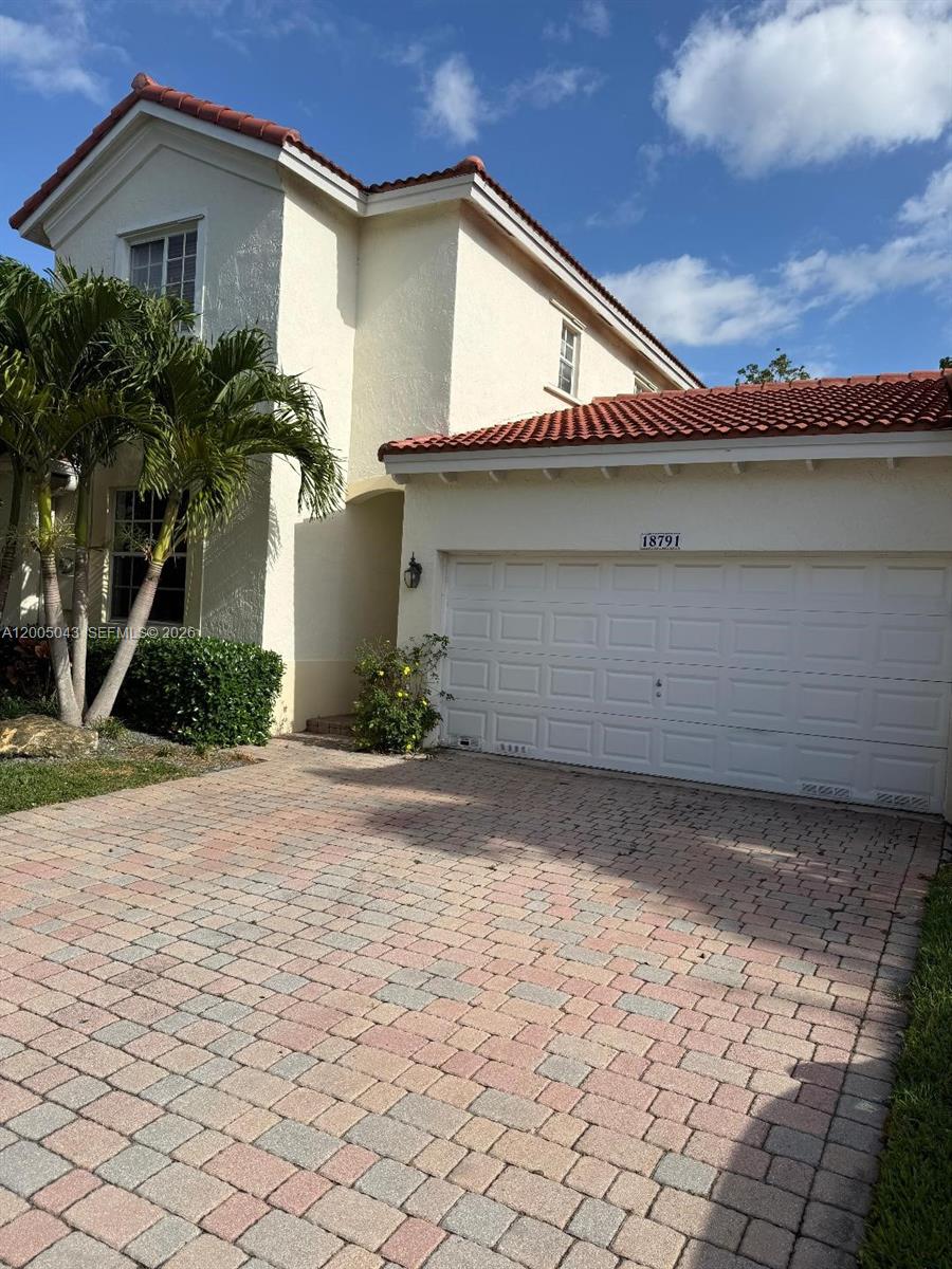 18791 Southwest 25th Court Miramar, FL 33029 - Photo 1 of 4 a house view with a outdoor space