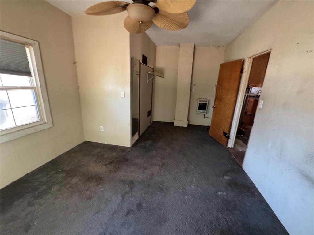 114 Main Street Haslet, TX 76052 - Photo 14 of 14 a view of empty room with a fireplace