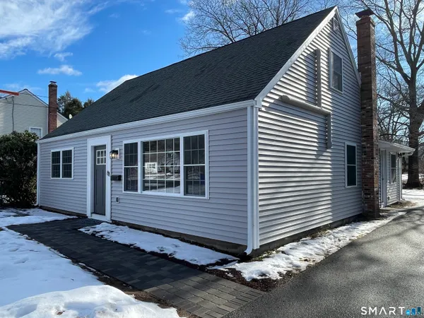 a view of a house with a garage