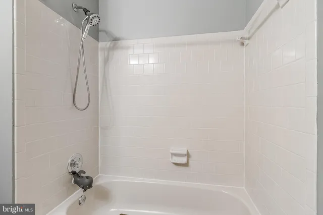 a view of a hallway with front door