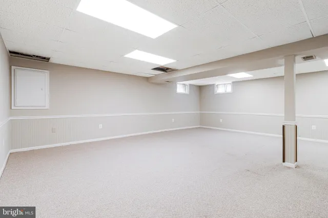 a bathroom with a sink toilet and vanity