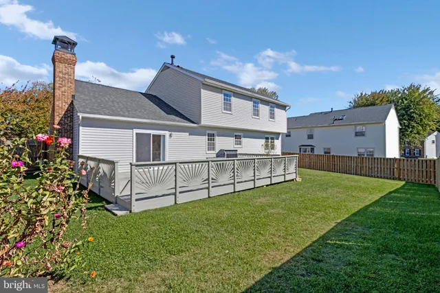 a view of backyard with a garden and plants