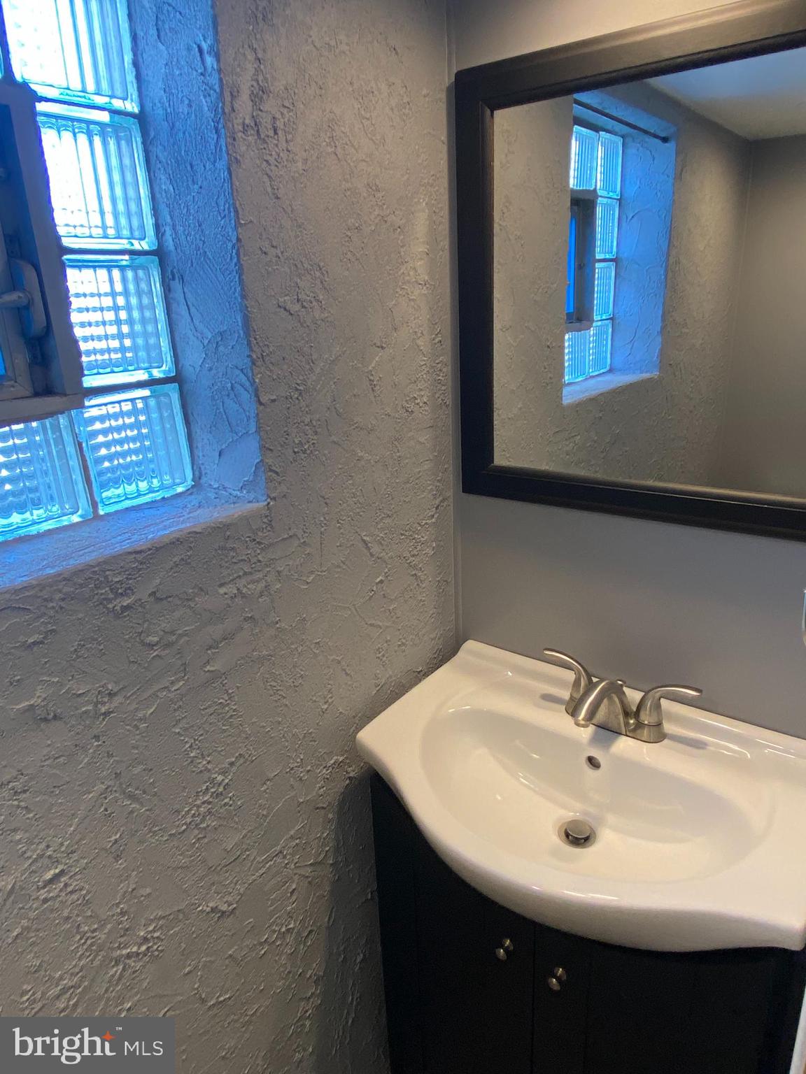 9935 Medway Road Philadelphia, PA 19115 - Photo 23 of 24 powder room basement