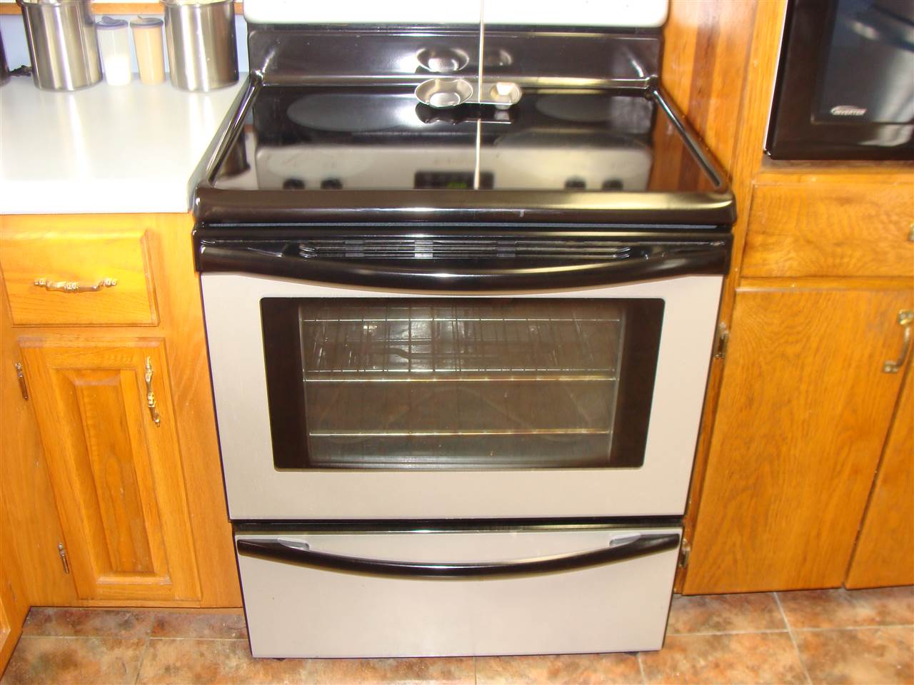 10838 Cook Town Road Bridgewater, VA 22812 - Photo 15 of 44 a stove top oven sitting inside of a kitchen