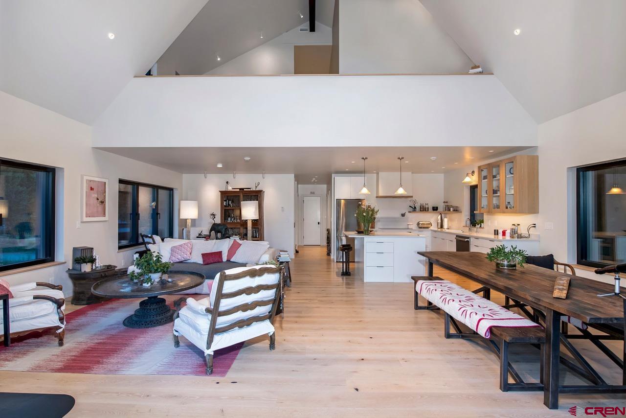 624 Nicholson Lake Ridge Road Crested Butte, CO 81224 - Photo 15 of 43 a living room with furniture and wooden floor