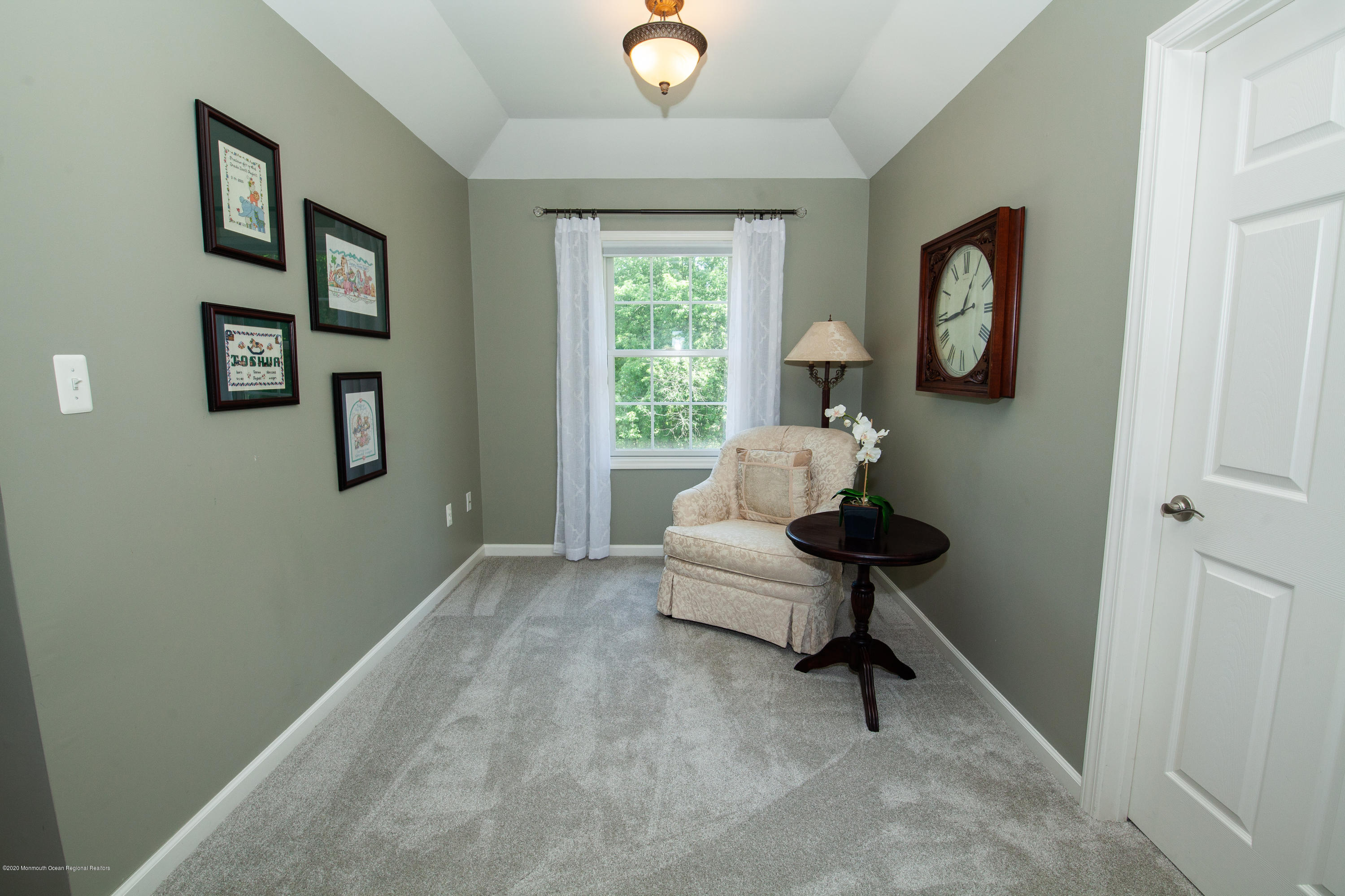 2228 Christopher Way Wall, NJ 07719 - Photo 11 of 25 a living room with furniture and a window