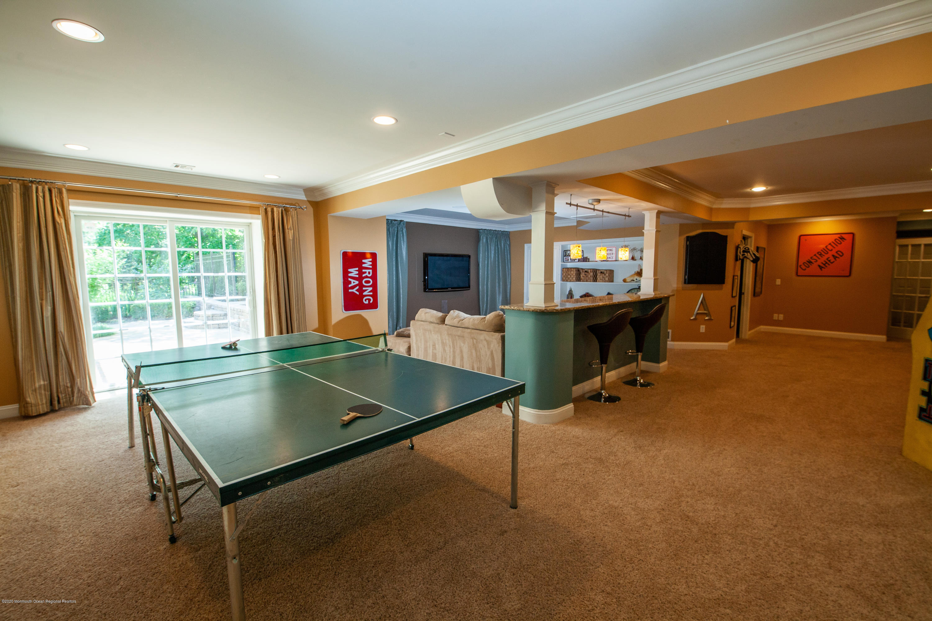 2228 Christopher Way Wall, NJ 07719 - Photo 17 of 25 a living room with furniture pool table and windows