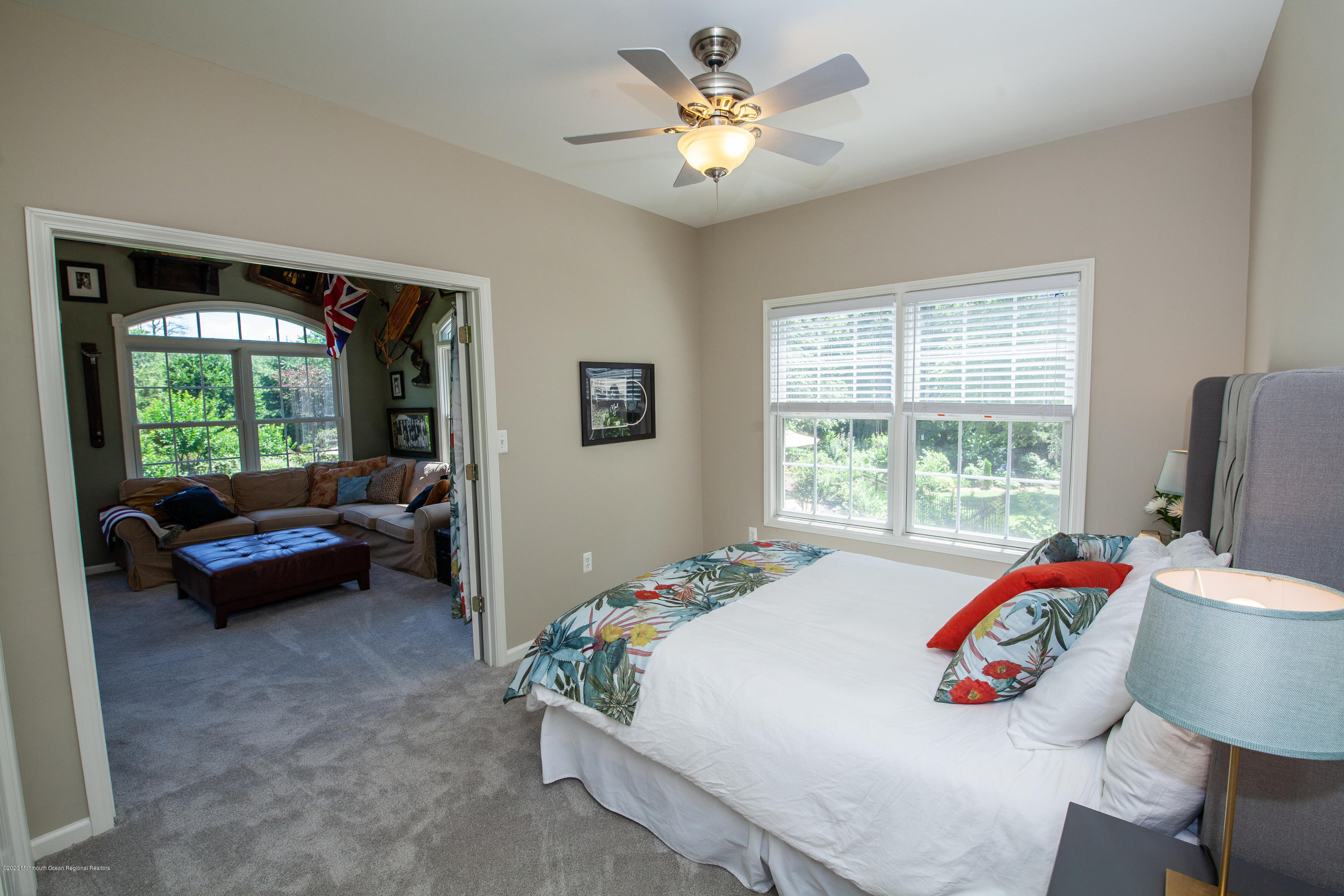 2228 Christopher Way Wall, NJ 07719 - Photo 7 of 25 a bed room with a bed and a chair