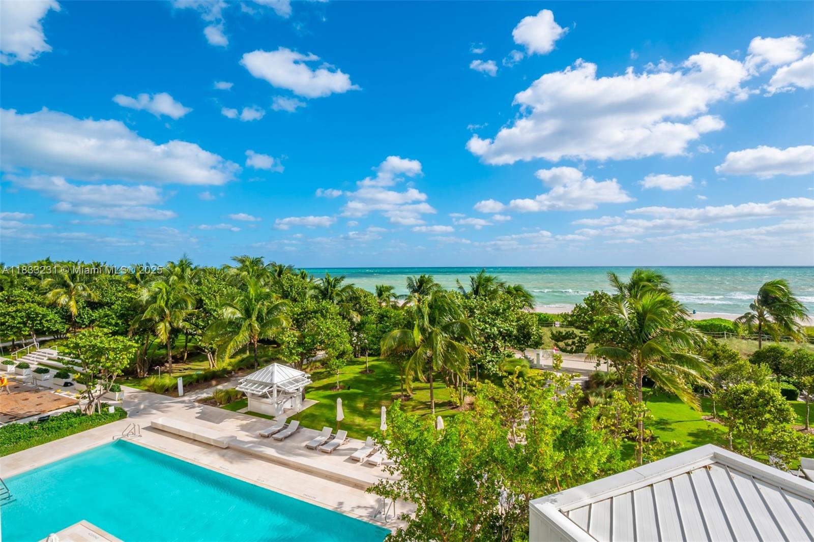 9001 Collins Avenue, Unit S305 Surfside, FL 33154 - Photo 7 of 23 a view of a yard with an outdoor seating