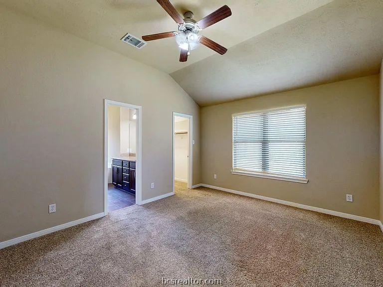2024 Mountain Wind Loop Bryan, TX 77807 - Photo 7 of 14 a view of an empty room with a window