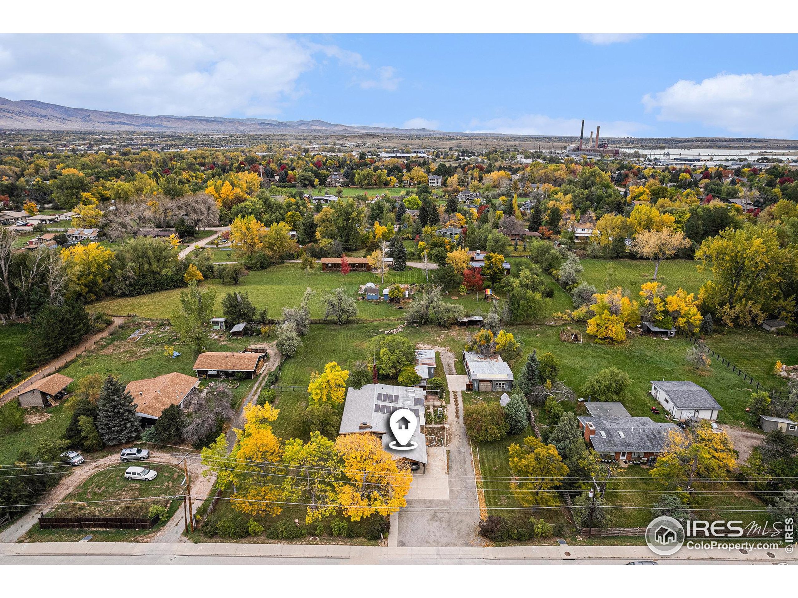 6137 Baseline Road Boulder, CO 80303 - Photo 27 of 40 an aerial view of a city with lots of residential buildings lake and ocean view