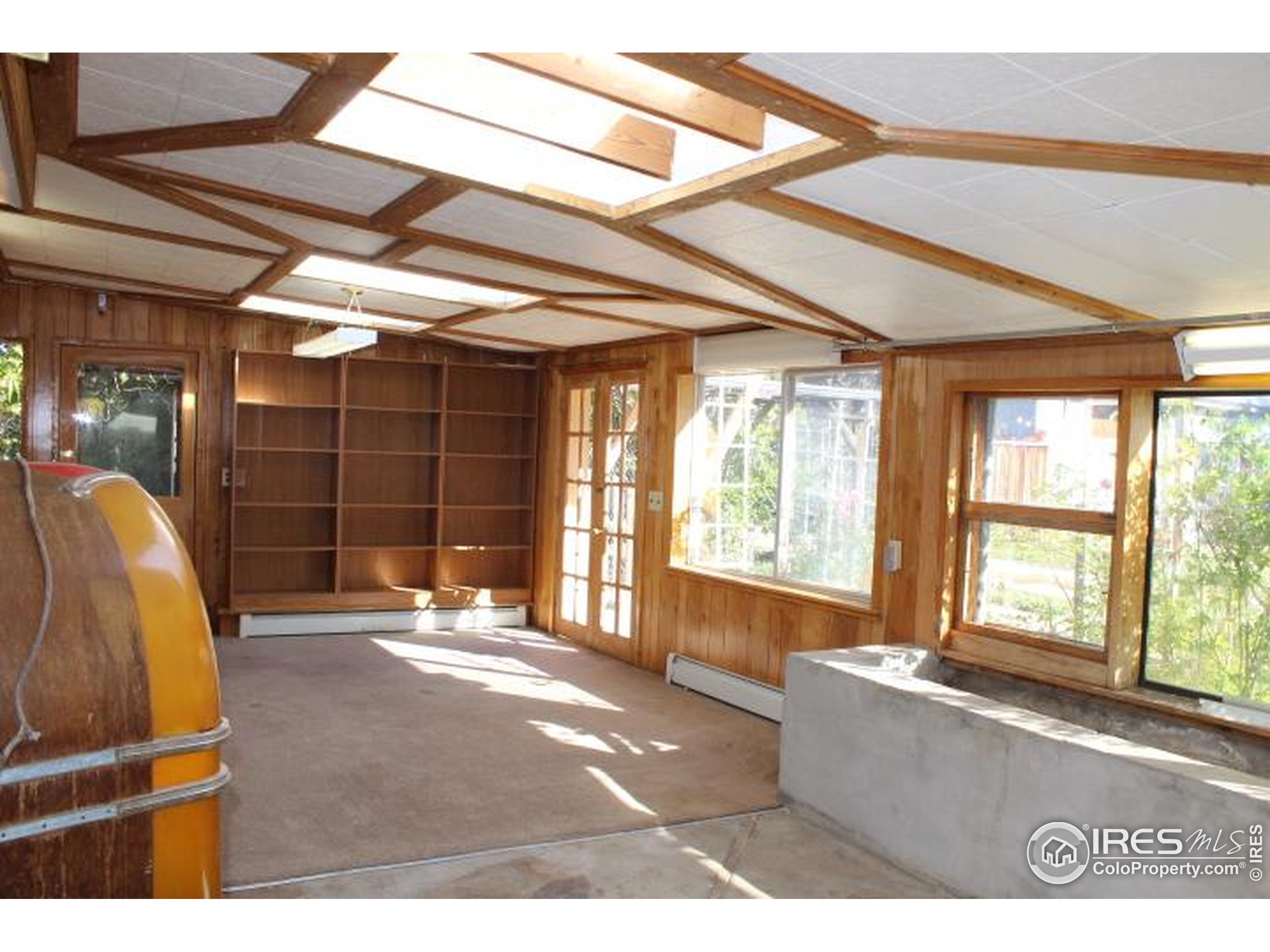 6137 Baseline Road Boulder, CO 80303 - Photo 6 of 40 a living room with a large window
