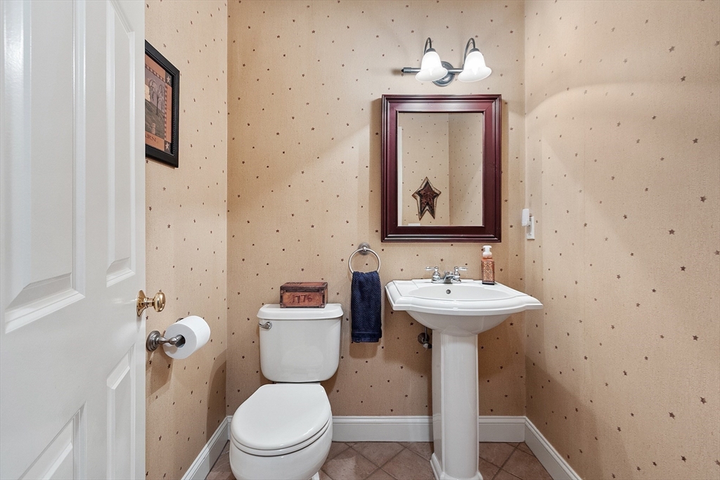 2 Taymax Road Westminster, MA 01473 - Photo 16 of 41 a bathroom with a toilet sink and mirror