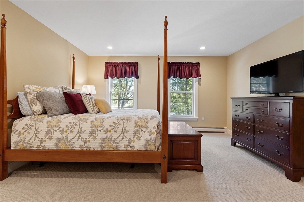 2 Taymax Road Westminster, MA 01473 - Photo 20 of 41 a bedroom with a bed and a flat screen television