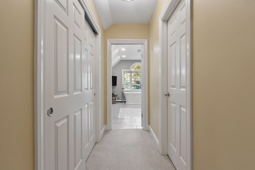 2 Taymax Road Westminster, MA 01473 - Photo 23 of 41 a view of a hallway with a livingroom and a bathroom with sink