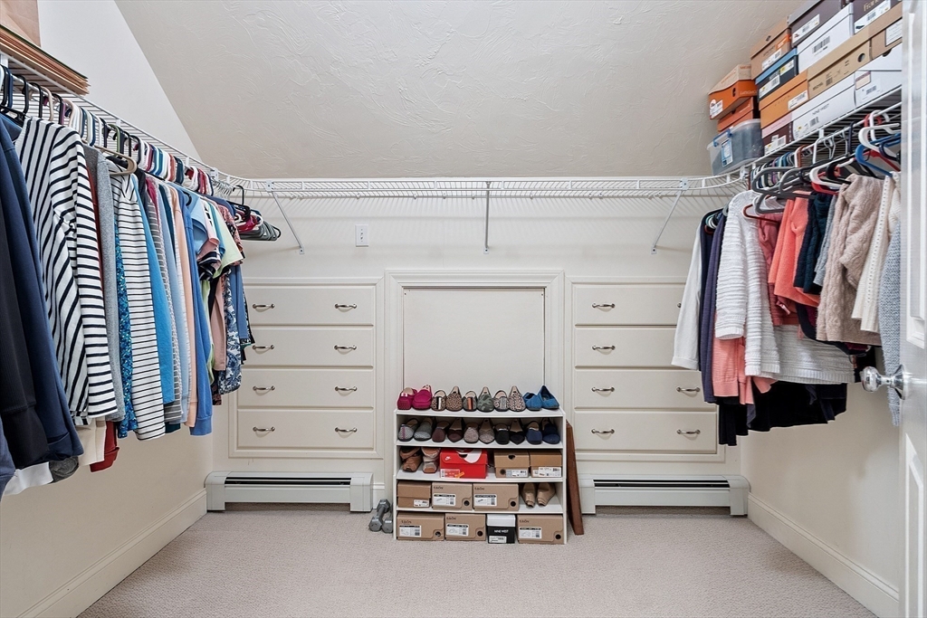 2 Taymax Road Westminster, MA 01473 - Photo 24 of 41 a view of walk in closet with clothes and shoes