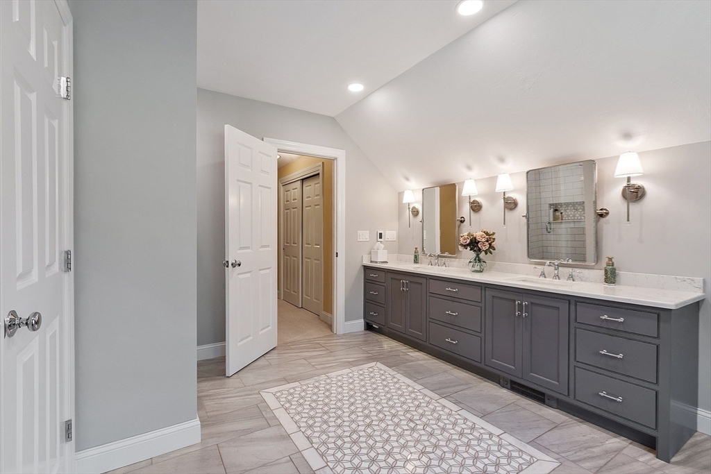 2 Taymax Road Westminster, MA 01473 - Photo 27 of 41 a spacious bathroom with a vanity a sink a mirror and a bathtub